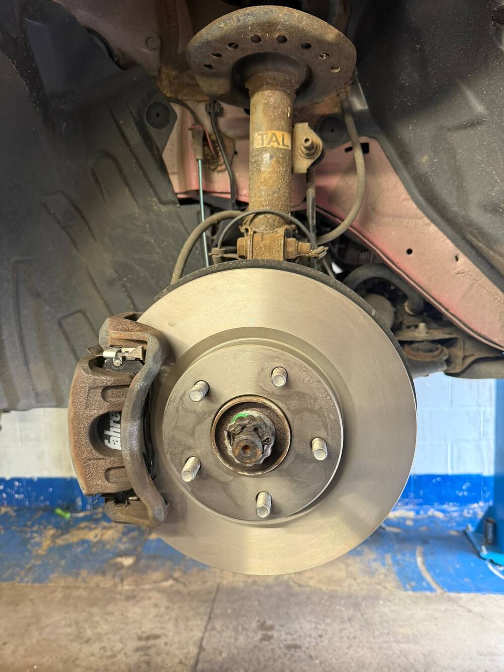 New front brake disc and pads fitted at Pam's MOT Centre in Bletchley