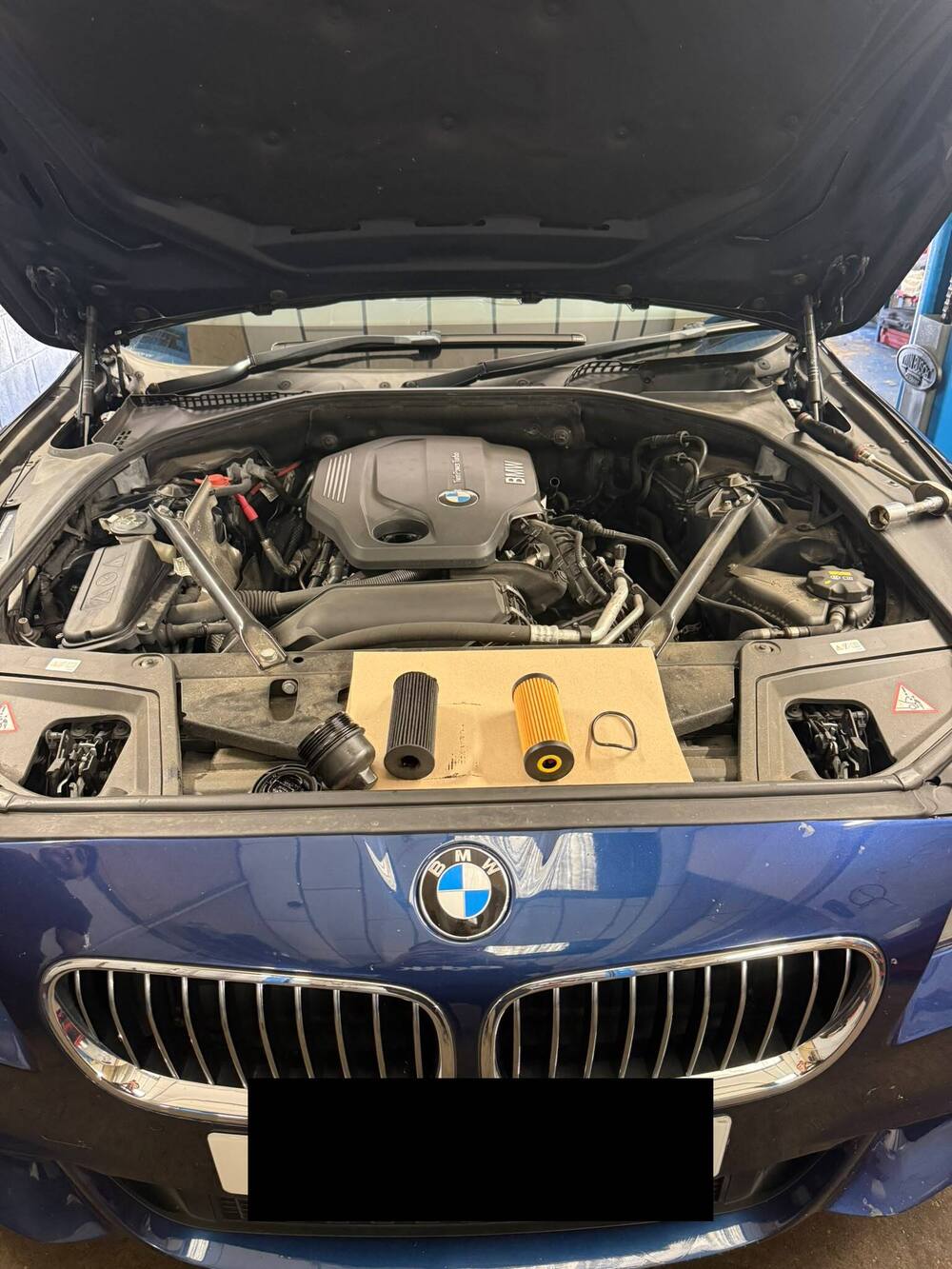 Genuine oil filter and gasket parts ready for an oil and filter change at Pam's MOT Centre